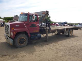 1989 Ford L8000 Boom Truck c/w Diesel, Showing 459,369 KMS, 20' Deck, 204" W/B, 11R22.5 Tires At 60%, Rear Tires At 20%, Front Axle Rating 4,082KG, Rear Axle Rating 9,525KG w/ Atlas AK400611 Mid Mount Picker, 2 Sections, Out Riggers, SN 3528, VIN 1FDPR82A2KVA06554 *NOTE: Running when parked"