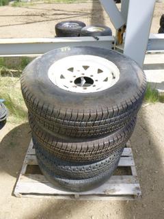 (4) Radial Trail Tires On Rims. ST 235/80R16 (WR1)