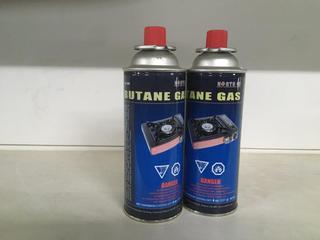 (2) Cans of Butane Gas.