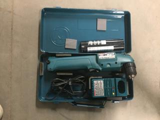 Makita 9.6 Volt, 10 mm Drill/Charger/2 Battery's.