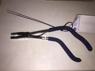 Right Angle Pliers.