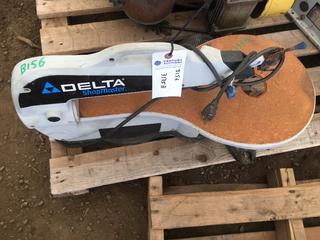 Delta Shopmaster Scroll Saw.
