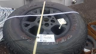 (4) Terrain Radial A/T P235/75 R16 Jeep Cherokee S Bolt Rims.