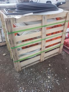 Crate of Assorted Plastic Hose.
