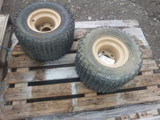 (2) Titan Turf Tamer A/T 18 x 11-8 c/w Rims.