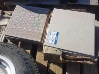 Quantity of Light Grey Tile 12" x 12".