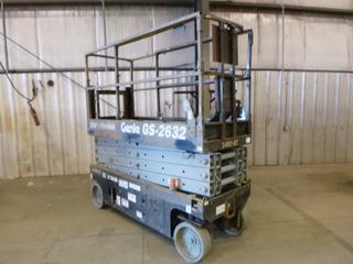 Genie GS-2632 500lb Cap Electric Scissor Lift w/ 89in X 32in Platform And 48in Platform Extension. Showing 541hrs. SN GS3207-85003. *Note: Missing Battery And Remote, Running Condition Unknown*