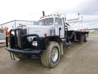 Kenworth Bed Truck C/w Cummins Engine, Diesel, 5 And 4 Twin Stick Transmission, Manual, 26' X 8'6" Bed, Live Roll, Flip-Over 5th Wheel Hitch, Braden Winch. Showing 288,518kms. SN 82317