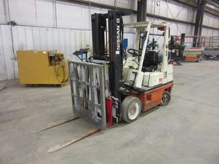 1991 Nissan CPH02A25V Propane Forklift C/w 4-Cyl Engine, Hydraulic Push Attachment. Showing 7094hrs.