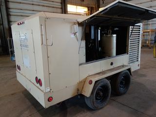 2003 Ingersoll-Rand T/A Portable Air Compressor c/w Cummins QSC 3.3 Diesel, Showing 5733 Hours. Last Filter Change 5732 hours. S/N 4073440BTB77