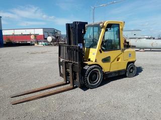 Hyster H100XM 10,000LB Forklift c/w Perkins 4 Cyl Diesel, EFOPS, 3 Stage Mast w/Side Shift, 70" Forks, 3:00-15 Front, 7:00x12 Rear Tires, Showing 5097 Hours. S/N K005002463. Note:  Buyer Can't Remove Until September 1st Unless Prior Arrangements Are Made.