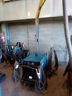 Miller Dimension 452 Welder c/w Ground Cable, Welding Feed, Set Up For Flux Core, Adjustable Boom, Fluxcore Gun.