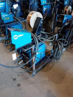 Miller XMT 350 On Cart c/w CC/CV, Mig Set UP, Cable, Welding Lead.c/w Miller 70 Series Wire Feeder. S/N# LC700187.