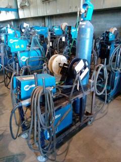 Miller MXT 350 Welder on Cart c/w 70 Wire Feed Control, Cables, For Mig & Fluxcore, Mig Gun, Small Roll of Mig & Fluxcore, Air Liquid Fluxshield & Flow Gauge. S/N# MB390020A.