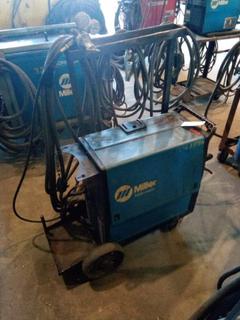 Millermatic 250X Wire Feeder On Cart For Mig c/w Roll of Mig Wire, Mig Gun, Ground & Power Cables. S/N# LB065329.