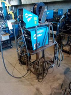 Miller XMT 350 Welder & 70 Series Feeder On Cart, Cables, Fluxcore Reel. S/N# LG480071A.