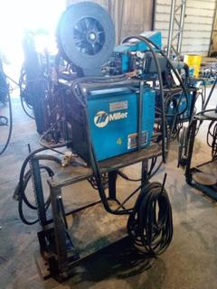 Miller XMT 350 Welder & 70 Series Feeder On Cart, Cables, Fluxcore Reel. S/N MA360182A.