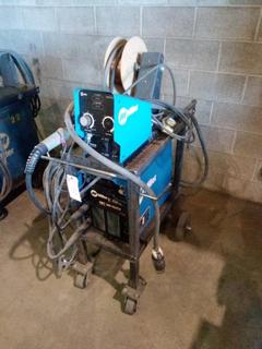 Miller XMT 350 Welder & 70 Series Feeder For Mig On Cart c/w Cables. S/N LG050232A.