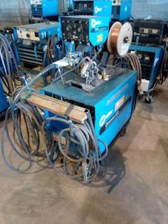 Miller Dimension 400 & Miller D54A 115V Wire Feeder c/w CC/CV DC Arc Welder, Set Up For Mig & Fluxcore, Mig Gun & Wire, Welding Lead, Cables, On Cart. S/N JK731132.