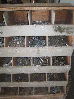 Quantity of Assorted Nuts, Bolts, Washers in Wooden Rack.Note:  Buyer Responsible For Dismantling, Lifting & Loading. Items Must Be Removed by September 1, 2020, 4:00 PM.  Items Left Onsite After September 1, 2020 Will Be Considered Abandoned.