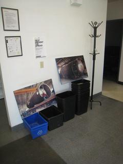 Coat Rack, Trash Can, Blue Recycle Bin, Pictures.