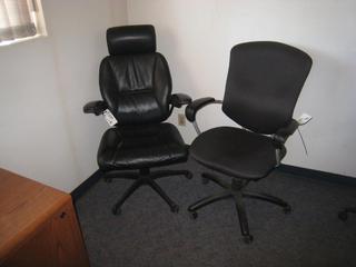 (1) Leather Office Chair, (1) Black Fabric Office Chair.