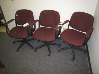 (3) Maroon Low Back Rolling Office Chairs.