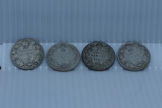 Lot of 4 Canada 25 Cent Coins.