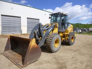 2009 John Deere 624K Wheel Loader C/w 104in Bucket, 5ft Forks, Brandt Jib Attachment, 13.5ft Extension. Showing 8131hrs. SN DW624KP623622. *Note: Item Cannot Be Removed Until 12PM July 23 Unless Mutually Agreed Upon*