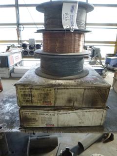 (2) Boxes Of Lincolnweld L-61 5/64in Coiled Wire Electrode And (3) Incomplete Spools of 5/64in Wire(Brand Unknown)