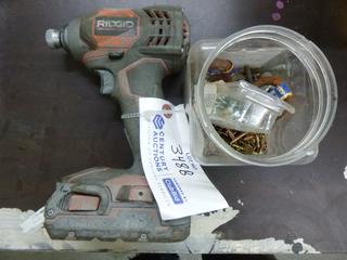 Ridgid R86034 18V Drill C/w Battery And Screws *Note: Running Condition Unknown*