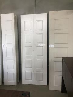 White Bifold Door, 29 5/8" W 78 1/2" H x 1 7/8" D.