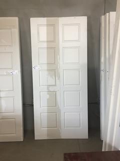 White Bifold Door, 35 3/4" W x 78 1/2" H x 1 7/8" D.
