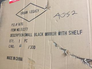 Small Black Plastic Mirror with Shelf,  Approximately  27" Tall x 20" wide.