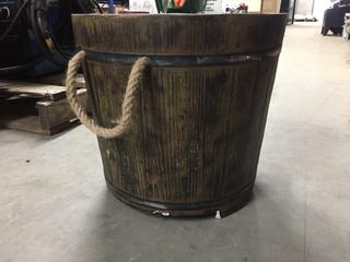 Plastic Planter with Rope Handles.