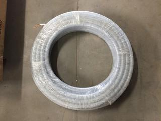 Roll of 1" PVC Suction Pipe.