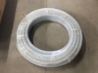 Roll of 1" PVC Suction Pipe.