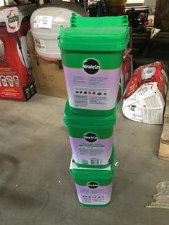 (3) Boxes of Miracle Grow Plant Food.