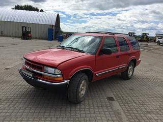 2000 Chev Blazer 4x4 SUV c/w 4.3L Auto, A/C, Set of (4) Winter Tires. S/N 1GNDT13WXY2179797. Showing 284,698 Kms.