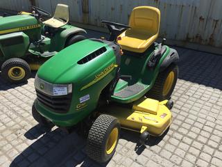 John Deere G110 Ride On Mower c/w Gas Power, 54" Mower Deck S/N 3403001411. Showing 1245 Hours.