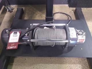 WARN 9500LB SPOOL WINCH WITH WIRE ROPE.