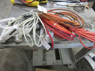 Assorted Extension Cords, Power Bars, and Pulley Wheels.