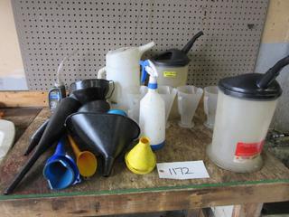 Shop Funnels and Spray Bottles. 