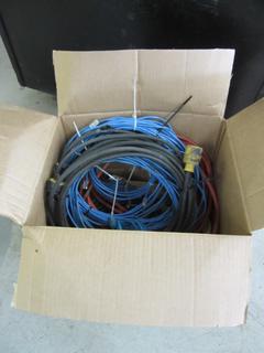 Box of Extension Cords and Ethernet Cords. 