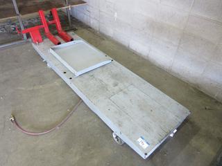 Off-Site - Motorcycle Lift c/w Ramp, Wheel Chock. Call Chris For Viewing @ 403 512-2504. Location: 100, 6143 48 Ave. Red Deer, AB Note:  Buyer Responsible For Lifting & Loading. Items Available For Load Out July 28th to 31st, 9:00 am to 4:00 pm Only. Items Left Onsite After July 31st, 2020 Will Be Considered Abandoned.