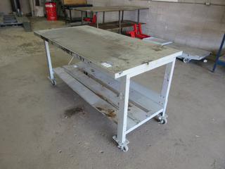 Off-Site - Steel Work Bench On Casters. 3'x6'x3'. Call Chris For Viewing @ 403 512-2504. Location: 100, 6143 48 Ave. Red Deer, AB Note:  Buyer Responsible For Lifting & Loading. Items Available For Load Out July 28th to 31st, 9:00 am to 4:00 pm Only. Items Left Onsite After July 31st, 2020 Will Be Considered Abandoned.