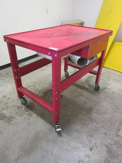 Off-Site - Rolling Work Bench. c/w Table Top Drain, Oil Catcher. Call Chris For Viewing @ 403 512-2504. Location: 100, 6143 48 Ave. Red Deer, AB Note:  Buyer Responsible For Lifting & Loading. Items Available For Load Out July 28th to 31st, 9:00 am to 4:00 pm Only. Items Left Onsite After July 31st, 2020 Will Be Considered Abandoned.