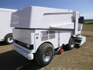 Zamboni 520 Ice Resurfacer C/w Ford 2.5L, Natural Gas, A/T, Showing 5,252 Hours, 1,000L Water Storage, Turning Radius At Conditioner 4.86M (16'), 1/2" x 5" x 77" Shaving Blade, Weight W/O 3,143 KG, Weight w/ Water 4,240 KG, SN 8583