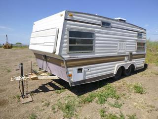 19' Holidaire H-1900 T/A Travel Trailer C/w Stove, Furnace, Water Pump, Rear Storage Rack, Ball Hitch, Sleeps 6, Propane Line Replaced, Signal Lights Replaced, Spring Susp, 185/70R14 Tires, 195/75R14 Rear Right Second Axle, SN R190H10650 *NOTE: Possible Leak In Lines*