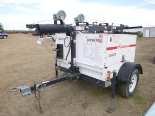 Magnum 8 KW Light Tower, Model MLT5080 c/w Kubota D1105 3 Cyl Engine, 4 Bulbs, S/A, Spring Susp, Pintle Hitch, Pancake Synchronous A/C Generator , Phase 1, 120/240V, Showing 11,838 Hours, SN 121939, VIN 5AJLS1415CB217939 *NOTE: Runs Well, Left Side Door Panel Does Not Latch*